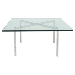 Mies van der Rohe Barcelona Glass Top Table: Ludwig Mies van der Rohe (German/American, 1886-1969) Mid-Century Modern "Barcelona" table, X-form chrome plated steel frame with square glass top. 19" H x 40" W x 40" D. Note: This item is only avail