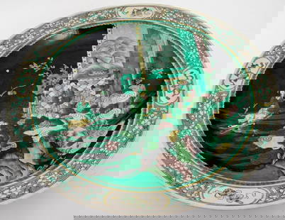 Chinese Yongzheng Mark Famille Noir Charger: Chinese ceramic porcelain charger bowl hand-painted in the famille noir palette with a central scene of four figures amongst a landscape encircled by a cherry blossom flower border, scrolling floral d