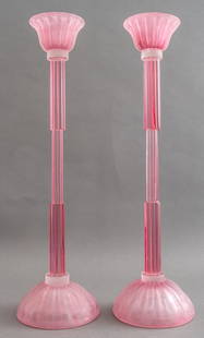 Karl Springer Attr. Murano Glass Candle Stands: Karl Springer (German/American, 1931-1991) attributed Italian Murano art glass candle stands, with circular raspberry pink scavo corroso cups and bases, conjoined by reeded tiered supports, apparently