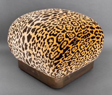 Karl Springer "Souffle" Modern Upholstered Ottoman: Karl Springer (German/American, 1931-1991) Postmodern "Souffle" ottoman pouf in leopard upholstery with metal frame, circa 1980. 19" H x 24" W x 24" D.