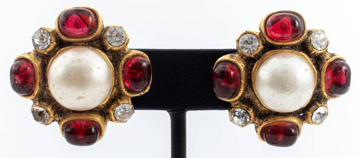 Vintage Chanel Runway Faux Pearl Clip Earrings: Vintage Chanel Runway gold-tone metal earclips mounted with central faux pearl cabochons, red glass, and colorless rhinestones, 1985, each marked "CHANEL (c) (R) CC / 1985" to reverse. 1.25" L x 1.25"
