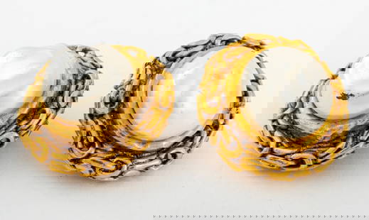 Chanel Faux Pearl Clip Earrings: Pair of Chanel faux pearl clip earrings with gold-tone metal chain link design, marked "(c) (R) / CHANEL / CC/ MADE IN FRANCE" to reverses. 1" diameter.