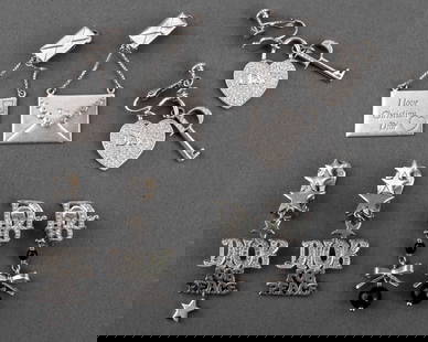 Christian Dior Sterling & Silver-tone Earclips, 4: Group designer costume jewelry lot of four Christian Dior clip earrings comprising one sterling silver envelope-form clip earrings, marked "925 / Dior" to clips, one silver-tone metal pair with bow an