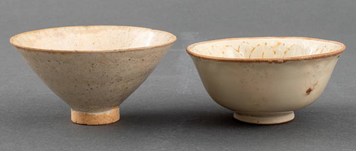 Chinese Ding Ware Porcelain Tea Bowls, 2: Archaic Chinese ding ware white glazed ceramic porcelain tea cups, one with molded chrysanthemum flower interior, one of flaring conical form, likely Song Dynasty (960-1279). Taller: 2" H x 4" diamete