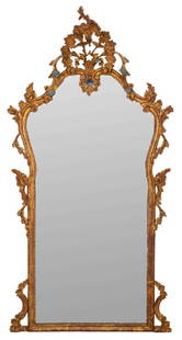 Italian Rococo Revival Giltwood Mirror, 19/20th C: Italian Rococo Revival gilt wood mirror, late 19th / early 20th century, the reticulated scrolling pediment above rocaille formed and shaped rectangular giltwood frame. Looking glass: 47" H x 23" W; f