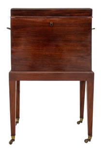 George III / Regency Mahogany Cellarette on Stand: Late George III or early Regency cellarette, circa 1810-1830, on later stand, the rectangular mahogany box with hinged lid and lead liner, on a rectangular base with reeded legs. 29.5" H x 17.5" W x 1