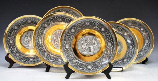 Set of 6 Fornasetti Italian Porcelain Plates: Fornasetti Milano gilded and hand-painted porcelain plates depicting mythological and/or biblical scenes, Italy; marked. Dimensions: 9-1/2"diameter x 1"H Provenance: Sold in Treadway Toomey 12/3/2006