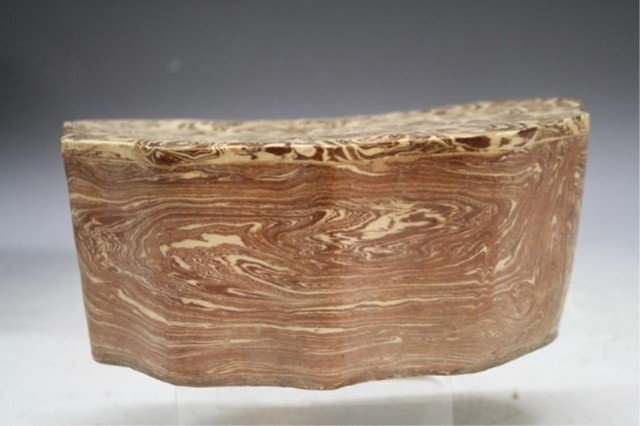 Chinese Ceramic Pillow Song Dynasty: Ceramic pillow with brown glazing, China, Song Dynasty (960-1279); unmarked. Dimensions: 3-1/2"H x 8"W x 5-1/4"D