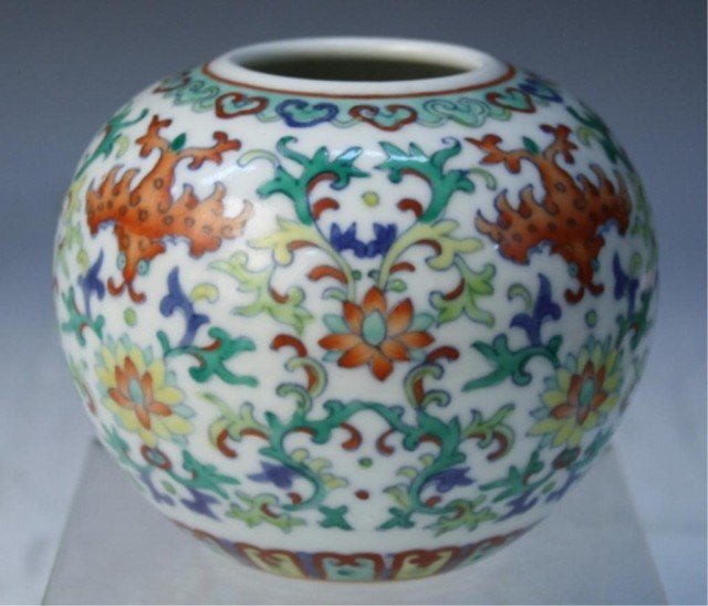 Chinese Doucai Glazed Porcelain Water Pot: Small doucai glazed porcelain water pot with bats and flowers, China; marked. Dimensions: 3-1/4"H x 3-3/4" diameter