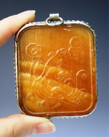 Chinese Pendant of Horn Carving w/ Bats: Pendant of horn carving with bats and mythical creature on reverse side, China; unmarked. Dimensions: 2-1/2"H x 2"W x 1/2"D