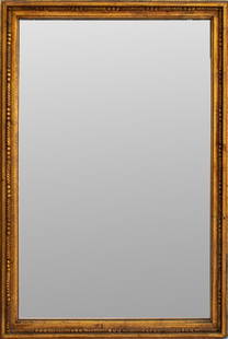 French Louis XVI Style Giltwood Mirror: French Louis XVI style carved gilt wood mirror. 30.5" H x 20.5" W x 1.25" D.