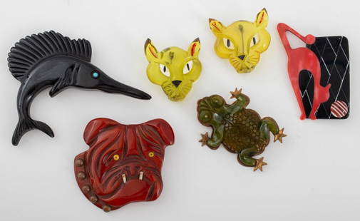 Vintage Lea Stein, Etc Animal Bakelite Brooches, 6: Group jewelry lot of six vintage Bakelite pins comprising one carved into the face of a bulldog, one black Bakelite swordfish brooch, one cat silhouette pin marked "LEA STEIN / PARIS" to reverse, two