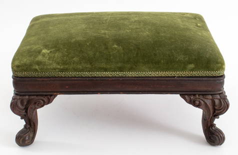 Rococo Revival Green Velvet Upholstered Foot Stool: Rococo Revival mahogany wood footstool upholstered in green velvet with molded seat rail on four scroll-carved cabriole legs. 8" H x 16" L x 12" D.