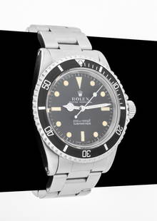 Rolex Submariner Meter First Dial Watch, 1968: Rolex Oyster Perpetual Submariner, ref 5513, serial # 1967049, meter first dial, stainless steel case with black aluminum bezel, black dial and luminescent indexes, 26 jewel automatic movement, stainl