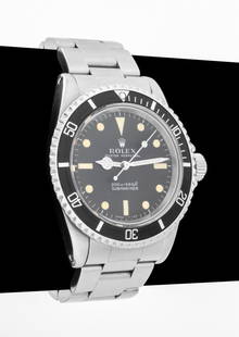 Rolex Submariner Meter First Dial Watch, 1968: Rolex Oyster Perpetual Submariner, ref 5513, serial # 1967049, meter first dial, stainless steel case with black aluminum bezel, black dial and luminescent indexes, 26 jewel automatic movement,