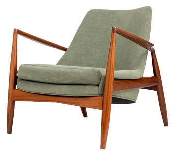 Ib Kofod-Larsen Seal Scandinavian Modern Chair: Ib Kofod-Larsen (Danish, 1921 - 2003) Scandinavian Mid-Century Modern "Seal" low-back or lounge chair, circa 1960s, with teak wood frame and green upholstery. 29" H x 32" W x 32" D; seat: 15" H. Prove