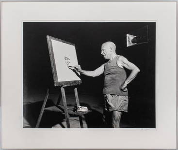 Andre Villers Photograph of Picasso, 1955: Andre Villers (French, 1930-2016) photograph of Pablo Picasso (Spanish, 1881-1973), signed, stamped, and dated to reverse, housed under Plexiglas in a silver-tone metal frame. Image: 16" H x 20" W; fr