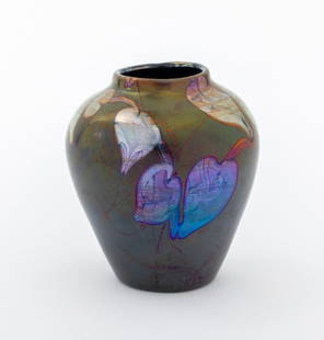 L. C. Tiffany Favrile Glass Cabinet Vase, ca. 1901: Louis Comfort Tiffany (American, 1848-1933) favrile art glass decorated cabinet vase, circa 1901, the shouldered ovoid vessel in deep green glass with deep black blue iridescence and decorated with tr