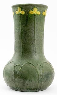 Grueby Pottery Matte Green Vase, ca. 1905: Grueby Pottery Arts and Crafts period ceramic earthenware vase with matte green glaze, circa 1905, molded leaf design to squat base with stems rising up the elongated neck terminating in stylized tref