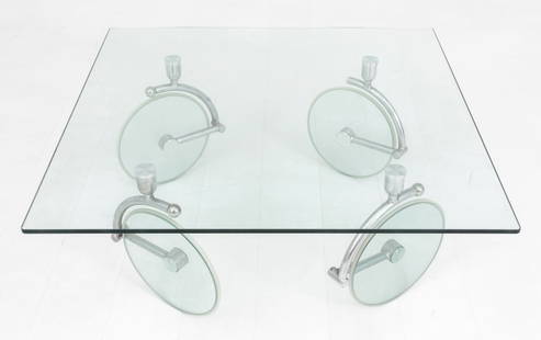 Gae Aulenti Fontana Arte Bicycle Tour Coffee Table: Gae Aulenti (Italian, 1927-2012) for Fontana Arte Postmodern design "Bicycle Tour" low coffee table, circa 1980, with square glass top on four metal mount wheels. 18" H x 40" W x 40" D. Provenance: Pr