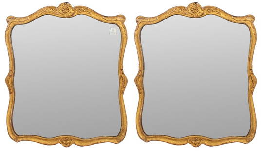 Rococo Revival Giltwood Mirrors, Pair: Pair of Rococo Revival gilt wood mirrors in a shaped square frame centering mirror plates. 35" H x 29" W. Provenance: Doyle Auction, New York, January 24, 2007, Lot 1130; from a 635 Park Avenue estate