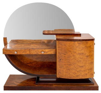 Art Deco Ebonized Ashwood Dressing Table, 1930s: Art Deco part ebonized ash wood veneered dressing or vanity table in the manner of Donald Deskey (American, 1894-1989), with a large circular mirror plate above a dressing table with two long drawers