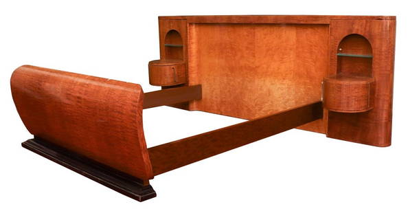 Art Deco Satinwood Bed with Table Cabinets, 1930s: Art Deco satinwood bed with conjoined end table cabinets, 1930s, the rectangular headboard with satinwood veneer between two arched niches containing half-round drum cabinets with nickel-plated steel