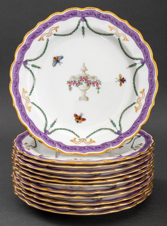 Royal Worcester Bone China Luncheon Plates, 12: Set of twelve Royal Worcester English bone china luncheon plates, each with puce underglaze marks and iron red "W" for 1885, each plate with scalloped gilded border and purple rim, the cavetti decorat