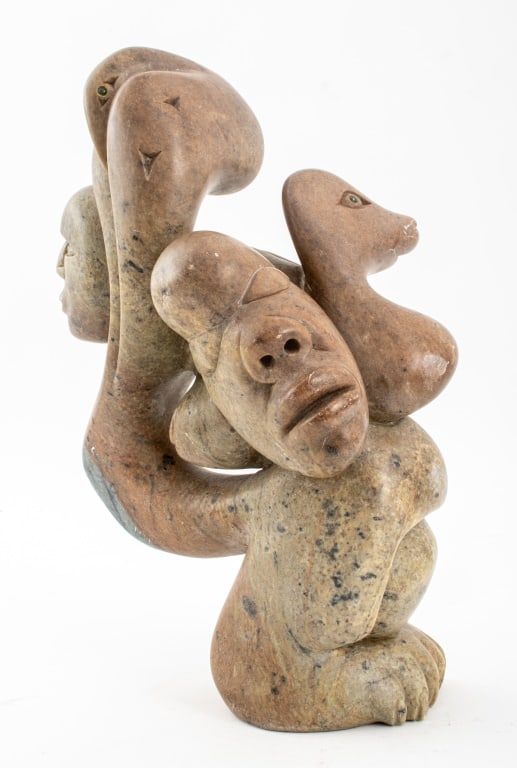 Abraham Anghik Ruben Carved Stone Sculpture: Abraham Anghik Ruben (Canadian, Inuit, b. 1951) carved stone sculpture of mystical anthropomorphic and animalier faces and body parts, some figures with greenstone inset eyes, signed to underside with