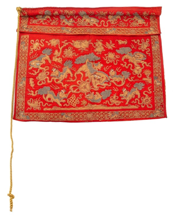 Chinese Gold Thread Foo Lion Embroidery: Chinese gold thread embroidery on a hand-woven red cloth ground hand-sewn decoration comprising foo lion dogs and auspicious Buddhist symbols. 32.5" H x 39" W. Provenance: Property from the Manhattan