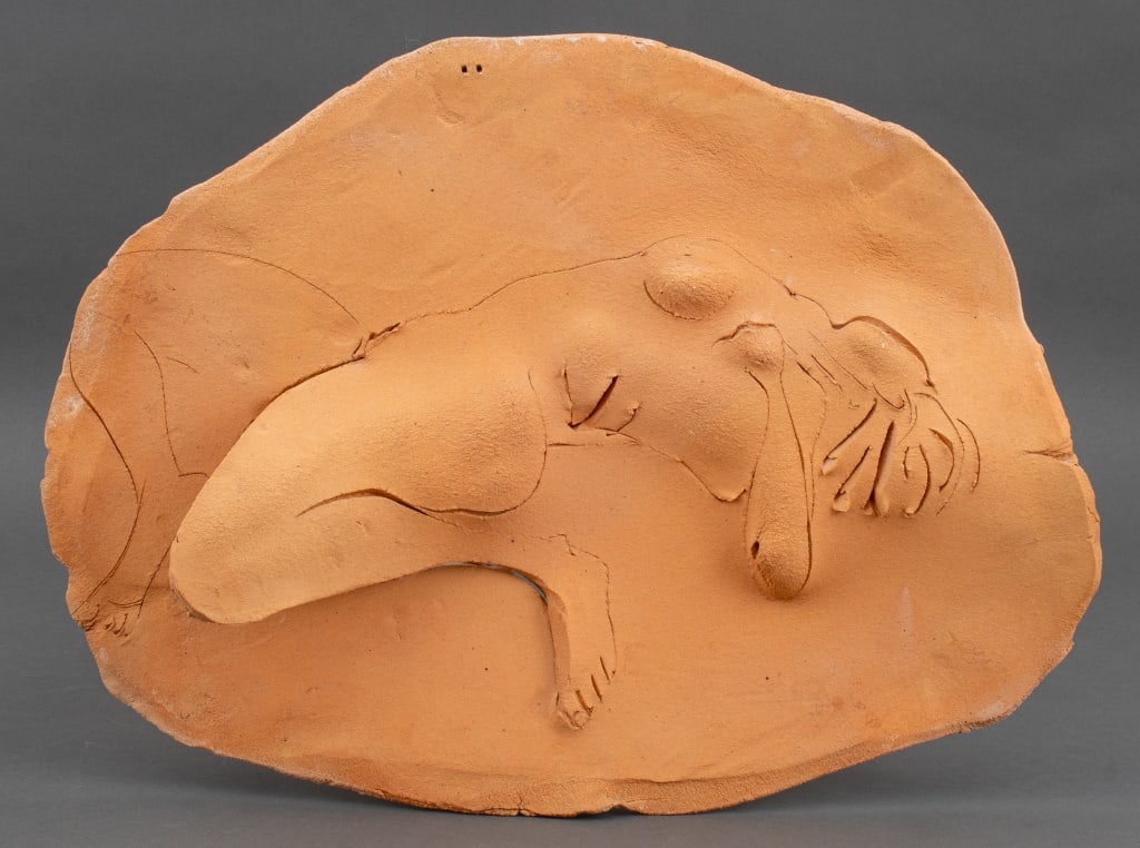 Mary Frank Reclining Nude Terracotta Sculpture: Mary Frank (British, b. 1933) ceramic terracotta sculpture depicting a reclining nude woman, her leg in high relief, signed to reverse. 21.5" L x 17.5" W. Provenance: Property from an East Village est