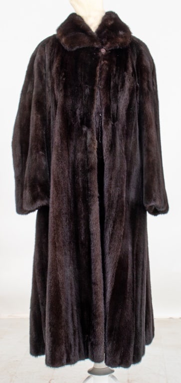 Mink Full-Length Fur Coat: Mink full-length fur coat, lined with embroidered and monogrammed black silk lining. No size or brand label present. Measurements: Shoulder: 21"; Bust: 50"; Length: 48"; Sleeve Length: 24". Moth damag
