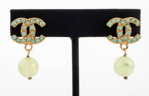 Chanel Runway Greenstone Gold-Tone Earclips, 2006: Pair of Chanel Runway Greenstone Gold-Tone Metal Drop Clip Earrings, Fall 2006, marked "(c) CHANEL (r) / 06 CC A / MADE IN FRANCE" to reverses. 1.5" L x 0.5" W. Provenance: From a 140 East 56th Street