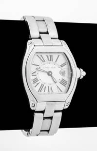 Cartier Roadster Stainless Steel Watch: Cartier Roadster Stainless Steel Watch, featuring silver dial with black enamel Roman numeral indexes, date window at 3 o'clock, battery powered quartz movement, worn on wrist with stainless steel lin