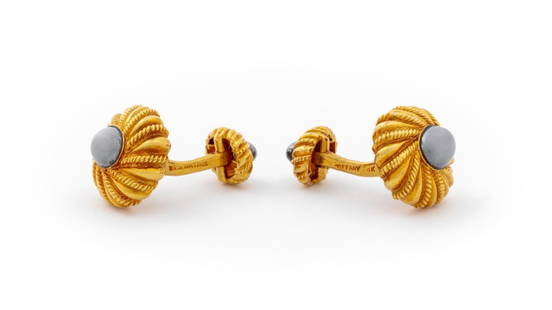 Schlumberger Tiffany & Co. 18K Hematite Cufflinks: Tiffany & Co. 18K Yellow Gold Cufflinks, designed by Jean Schlumberger, featuring four hematite cabochons weighing a total of approx. 9.75 carats, marked: "TIFFANY 18K SCHLUMBERGER". Measuring approx.