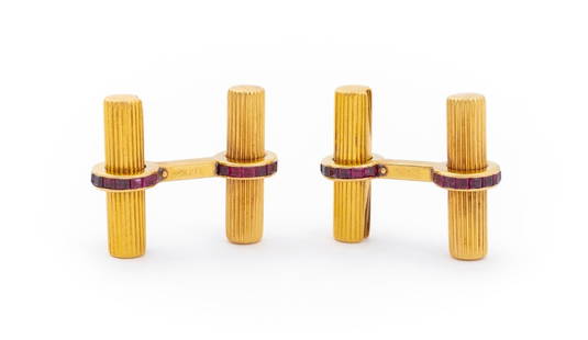 14K Yellow Gold Ruby Cufflinks: 14K Yellow Gold Cufflinks, designed with detachable fluted cylinders, featuring 56 channel set square rubies weighing a total of approx. 2.80 carats, marked: "14K". Measuring Approx. 7/8" x 1/8", 8.9