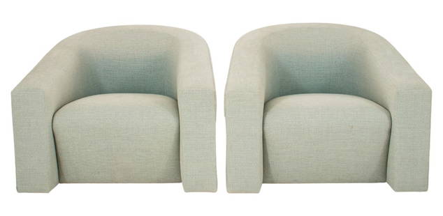 Donghia Italian Modern Swivel Arm Chairs, Pair: Pair of Donghia Italian Modern Lounge Armchairs, with cascading armrests on swivel bases, upholstered in a light celadon green, makers label on bottom. 29" H x 37" W x 37" D; seat: 16" H. Provenance: