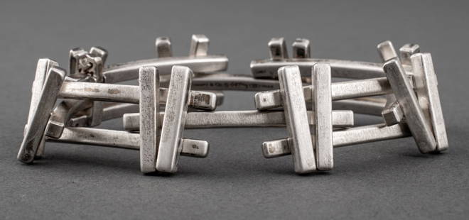 Frank Gehry for Tiffany & Co. Silver Axis Bracelet: Frank Gehry for Tiffany and Company Sterling Silver "Axis" Link Bracelet, marked "Tiffany & Co. / (c) Gehry / 925 / ITALY" inside. Approx. 6" L. weight: 62.9 g. Keywords: Designer jewelry, Architectur