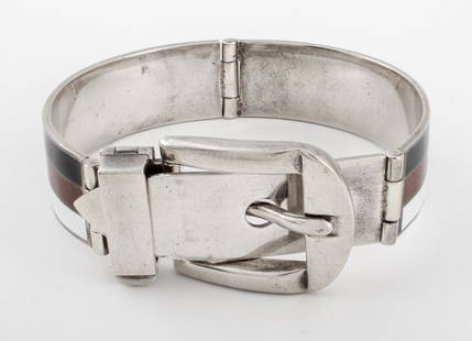 Gucci Enameled Sterling Belt Buckle Bracelet: Gucci Black, Brown, and White Enameled Sterling Silver Belt Buckle Form Bracelet, marked "GUCCI / ITALY / 925 / S" with Italian assay mark inside. 2.5" L x 2.25" W x 1" D; weight: 59.9 g. Keywords: De