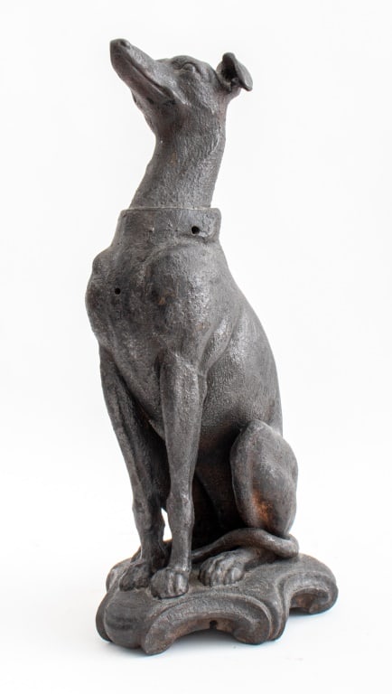 Victorian Cast Iron Whippet Sculpture: Victorian Cast Iron Whippet Sculpture, the dog on its haunches sitting upon a shield shaped base. 19" H x 9" D x 7" W.