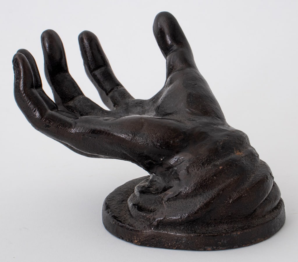 Rodin Style "Hand" Bronze Sculpture: Auguste Rodin (French, 1840-1917) style, "Hand", bronze, with label from manufacturer to underside. 5" H x 7" W x 5" D. Keywords: Rodin, Rodin sculpture, Bronze sculpture