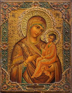 Russian Icon of the Tikhvinskaya Mother of God: Russian repousse and polychrome lithographed tin icon of the Tikhvinskaya Mother of God, Moscow area, likely 19th century or later, of typical form. 9" H x 7" W.