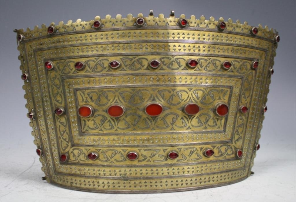 Turkoman Diadem w/ Carnelian Inlays 20th Cent.: Turkoman trapezoidal convex shaped gilded silver diadem with Carnelian inlays, twentieth century; unmarked. Dimensions: 13"W x 7-1/2"D