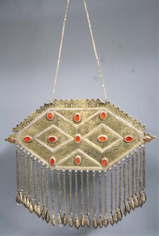 Turkoman Gilt Silver Chest Plate: Turkoman fire-gilded silver chest plate with carnelian inlays and hanging pendants, circa nineteenth to twentieth century; unmarked. Dimensions: 11-1/2"L x 13-1/2"W