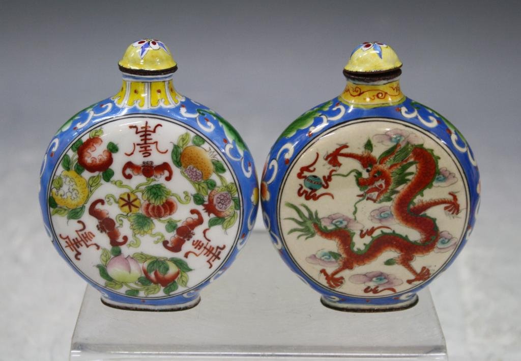 Chinese Lot of 2 Enamel Snuff Bottles: Lot of two snuff bottles with blue ground, one with bats, other with dragons, enamel, China; marked. Dimensions: each approximately 3-1/8"H x 2-3/8"W x 3/4"D