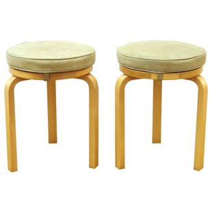 Alvar Aalto For Artek Scandinavian Modern Stools: Alvar Aalto for Artek Scandinavian Mid-century modern pair of wood stools with snake skin leather upholstery seats. Makers mark on the bottom. 28" H x 15.5" diameter.