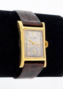 Patek Philippe 18K Gold Men's Watch: Patek Philippe Vintage 18K Yellow Gold Men's Watch, movement caliber 9 - 10, number 833069, case interior marked "18K / 0750 / Patek, Philippe & Co./ Geneve / Swiss / 653031", with leather band, circa