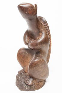 Benedict Tatti Squirrel Animalier Wood Sculpture: Benedict Michael Tatti (American, 1917-1993) Mid-Century Modern folk art-style hand-carved wood squirrel sculpture, together with a copy of a receipt from Roko Gallery. 13.5" H x 6.25" W x 5.25" D. Pr