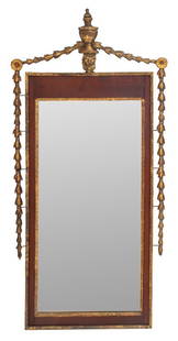 Italian Neoclassical Style Mahogany & Gilt Mirror: Italian Neoclassical Style Mahogany Mirror enhanced with gilt lion head and urn finial and flanked with gilt foliage garland, with mercury glass. 53" H x 26" W. Note: This item is only available for p