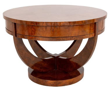 Art Deco Elm Burl Low Cocktail Table, 1930s: Art Deco Elm Burl Low Table, the circular book matched veneered top above a deep apron on four curving supports atop a stepped circular plinth, circa 1930s. 23" H x 34.5" diameter.
